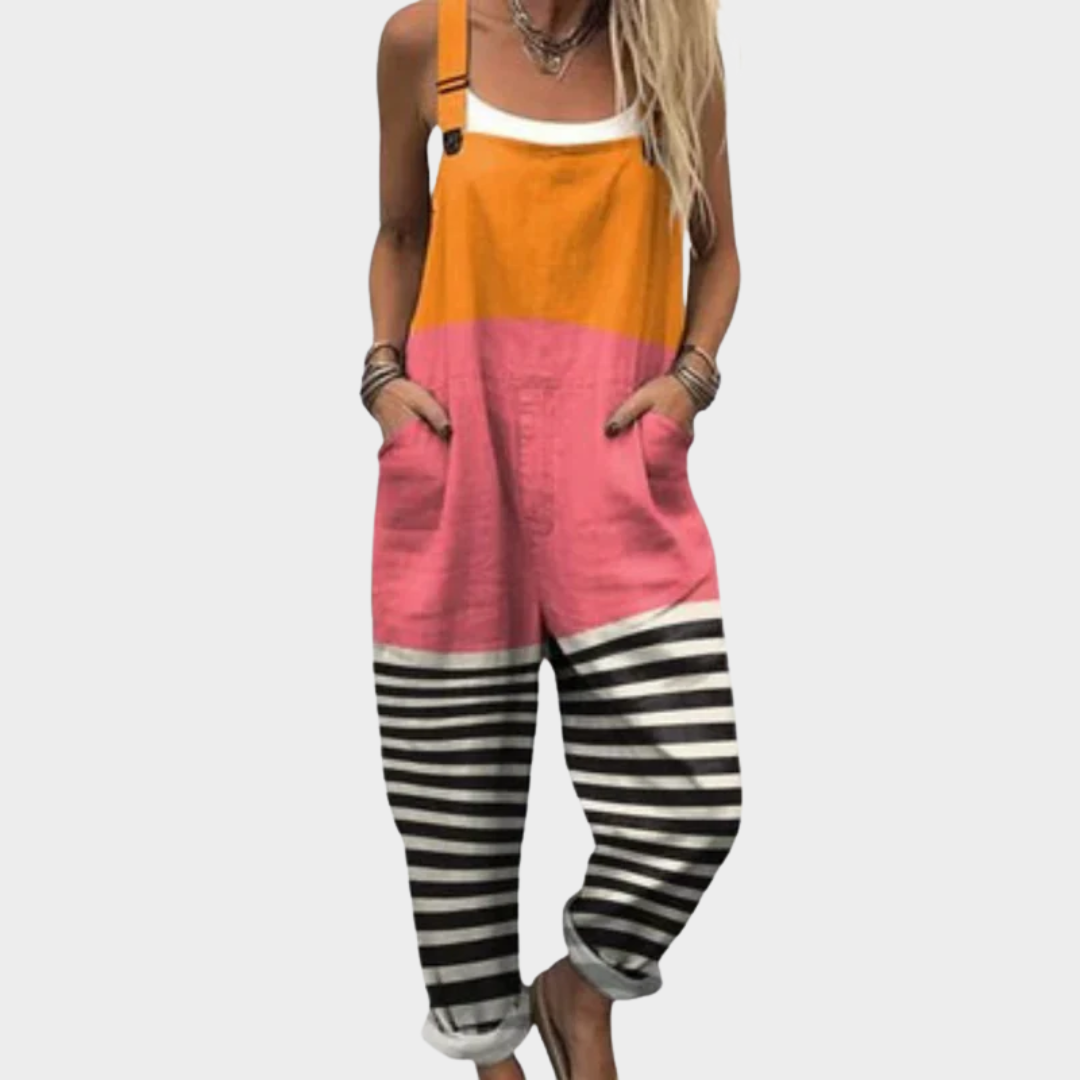 Colorblock printed overalls with orange top, pink center, black-and-white striped legs, bib front