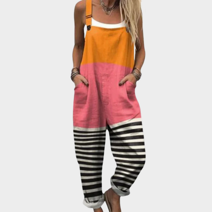 Colorblock printed overalls with orange top, pink center, black-and-white striped legs, bib front