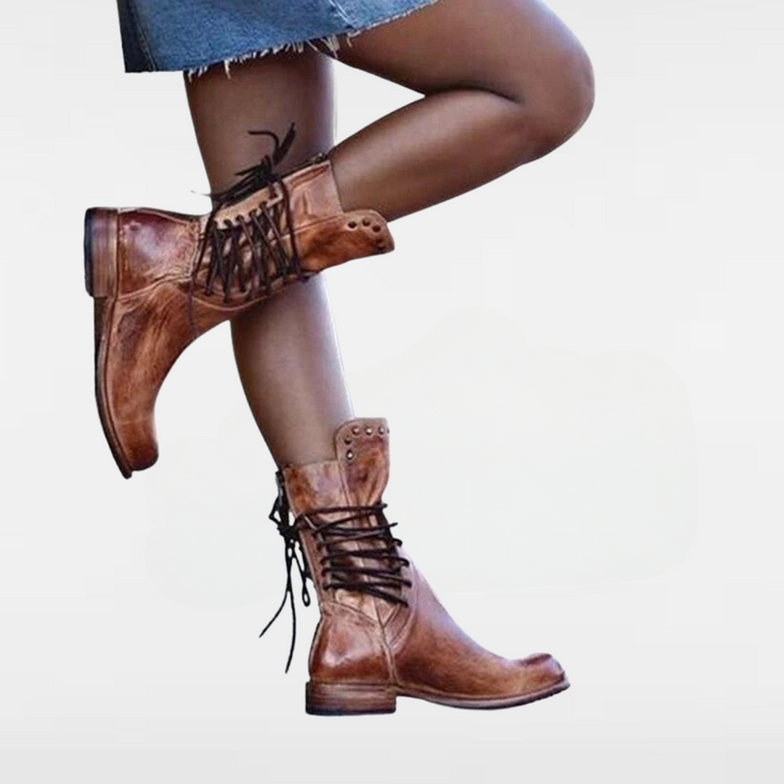 Rustic vintage leather lace-up boots with round studs and low stacked heel