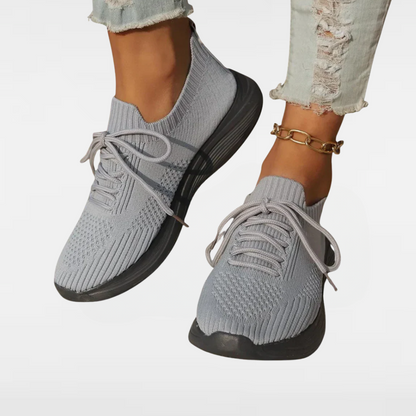 Gray knit lace-up sneakers with round toe and chunky cushioned sole
