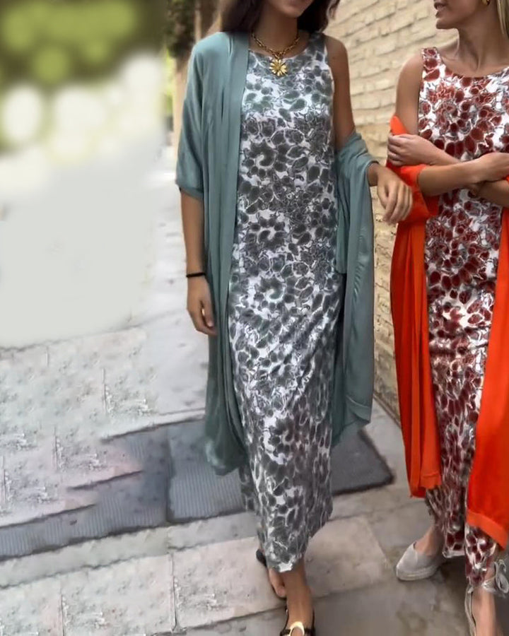 Blue two-piece set: sleeveless abstract-print maxi dress with teal lightweight cardigan
