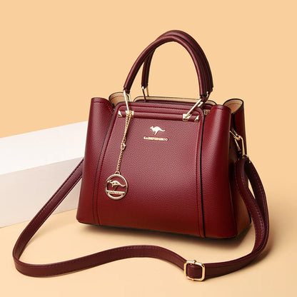Vaeni women’s structured handbag, burgundy pebbled leather, top handles and crossbody strap
