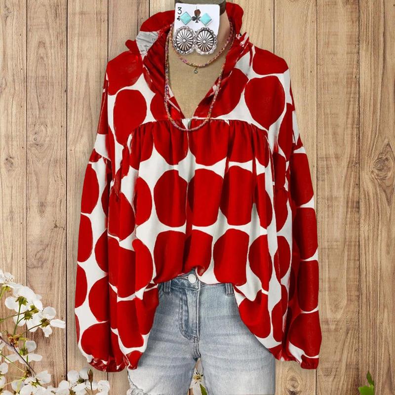Red and white dot print V-neck blouse with lantern sleeves