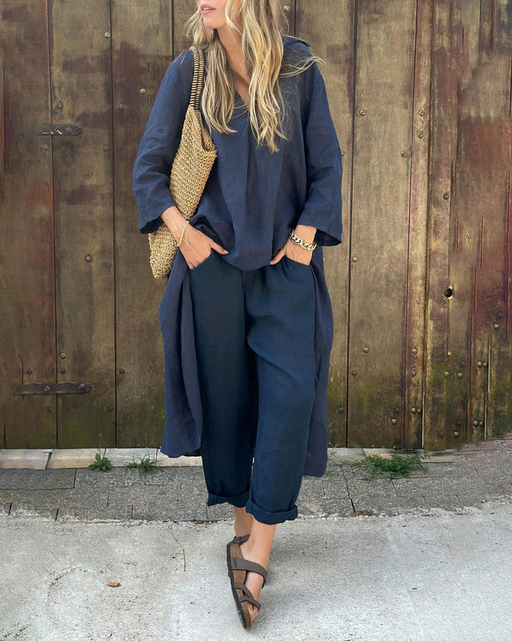 Navy blue two-piece set with V-neck tunic top and relaxed-fit cropped pants