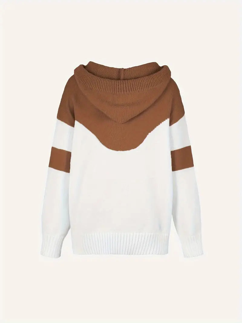Dual-tone cosy hoodie laid flat; hooded neckline with brown body and white sleeves
