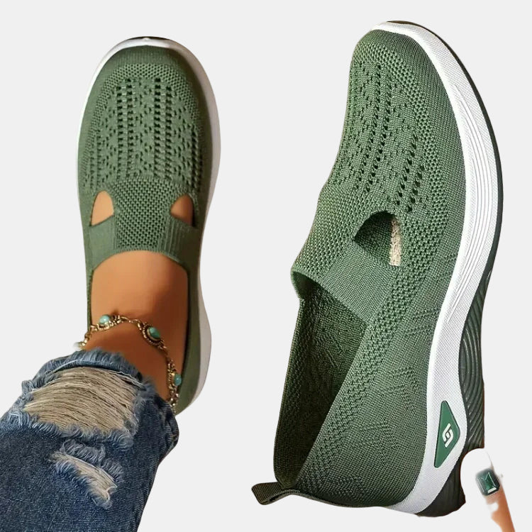 Green slip-on orthopedic walking shoe, knit upper with open toe cutouts, white sole.