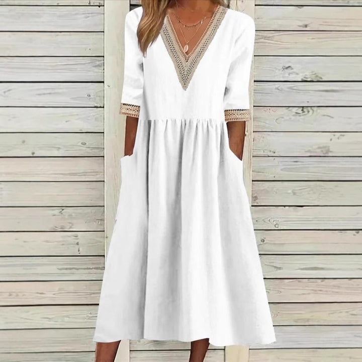 Lace-collar mid-length dress in white with V neckline and lace-trimmed three-quarter sleeves