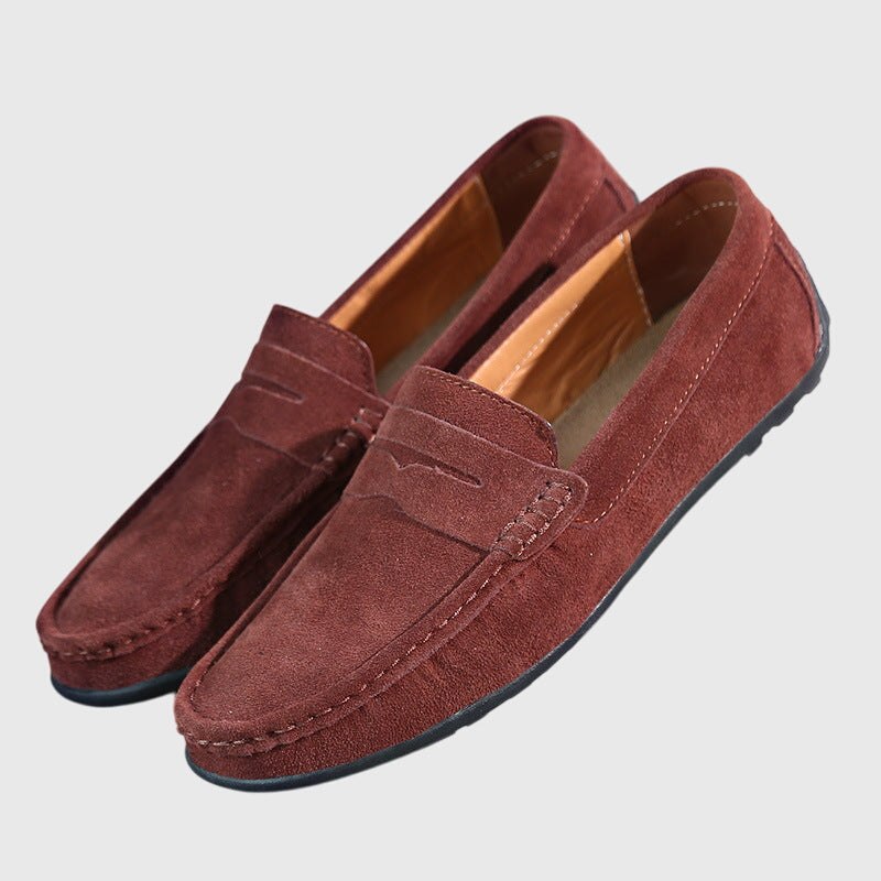 Burgundy suede orthopaedic loafers with slip-on penny strap and textured low sole