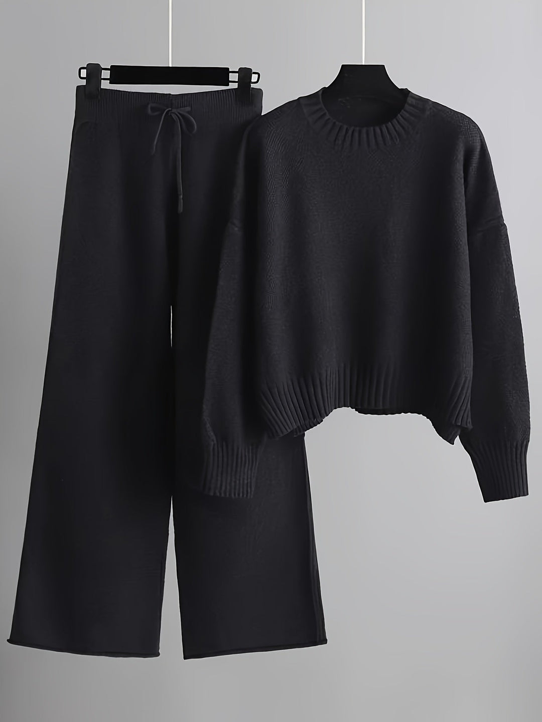 Black knit sweater and wide-leg trousers loungewear set