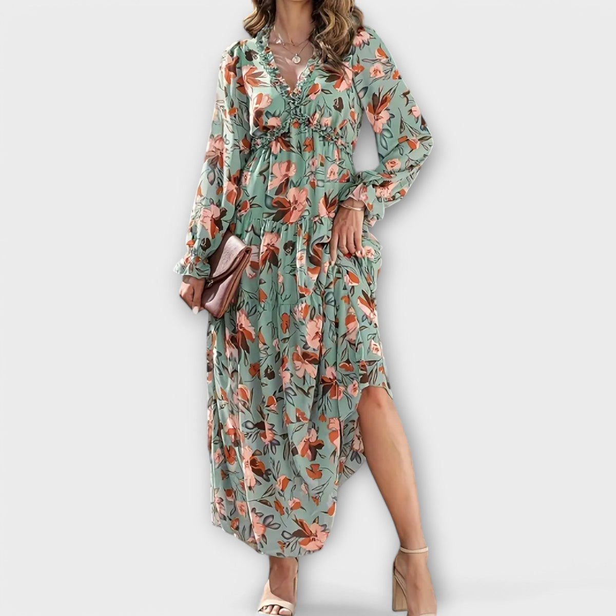 Floral maxi dress in teal with V-neck, long sleeves, tiered skirt and gathered waist