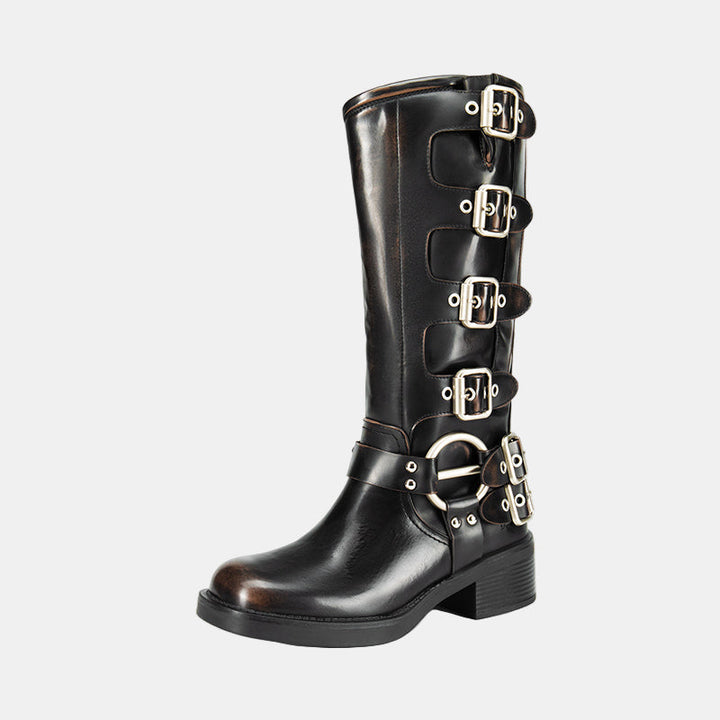 Knee-high leather boots in black with silver-tone buckles and ankle harness
