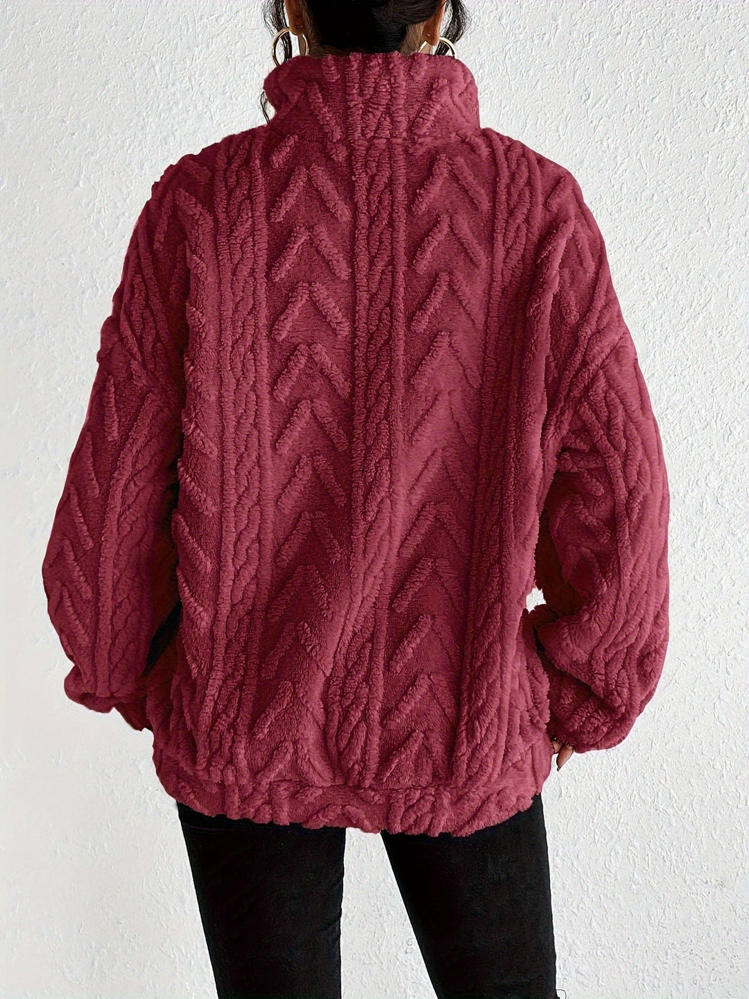 Warm knit quarter-zip sweater in burgundy with cable texture, long sleeves, back view.