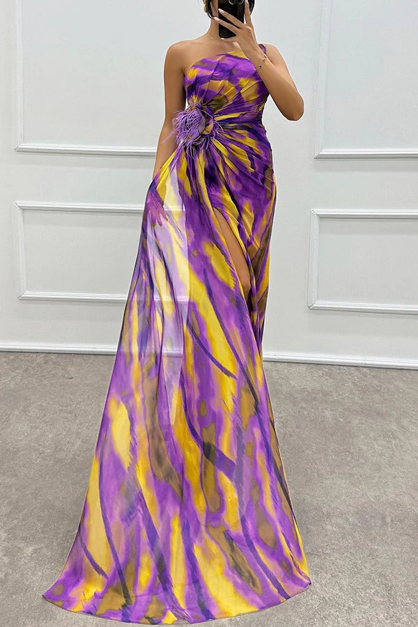 Strapless tie-dye maxi dress with front slit and flower detail, purple and yellow