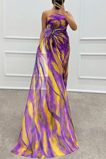 Strapless tie-dye maxi dress with front slit and flower detail, purple and yellow