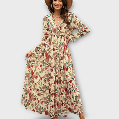Floral maxi dress with V-neck, long sleeves, gathered waist and flowing tiered skirt