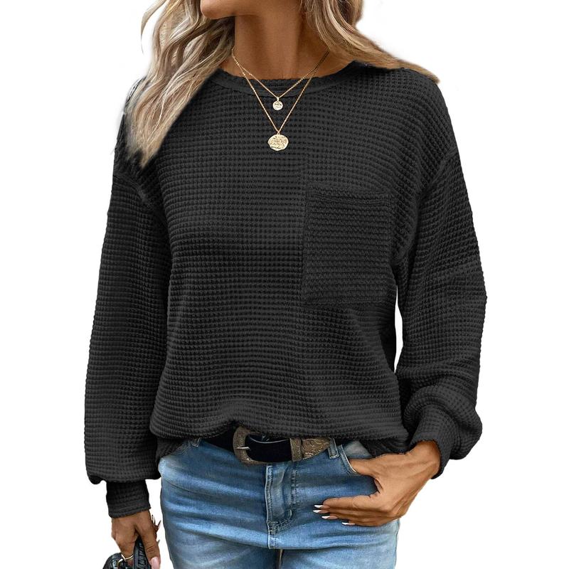 Black oversized long-sleeve crewneck blouse with waffle knit texture and chest pocket