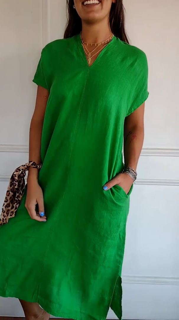 Green tummy-flattering dress, V-neck, short sleeves, side pockets