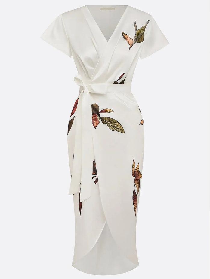 White wrap midi dress with V-neck, short sleeves, leaf print, and tied waist