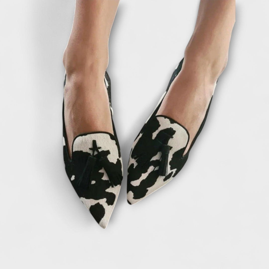 Steph elegant loafers with black-and-cream cow print, pointed toe, slip-on