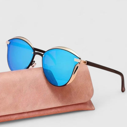 Blue mirrored sunglasses with metal-trim round lenses and dark brown arms