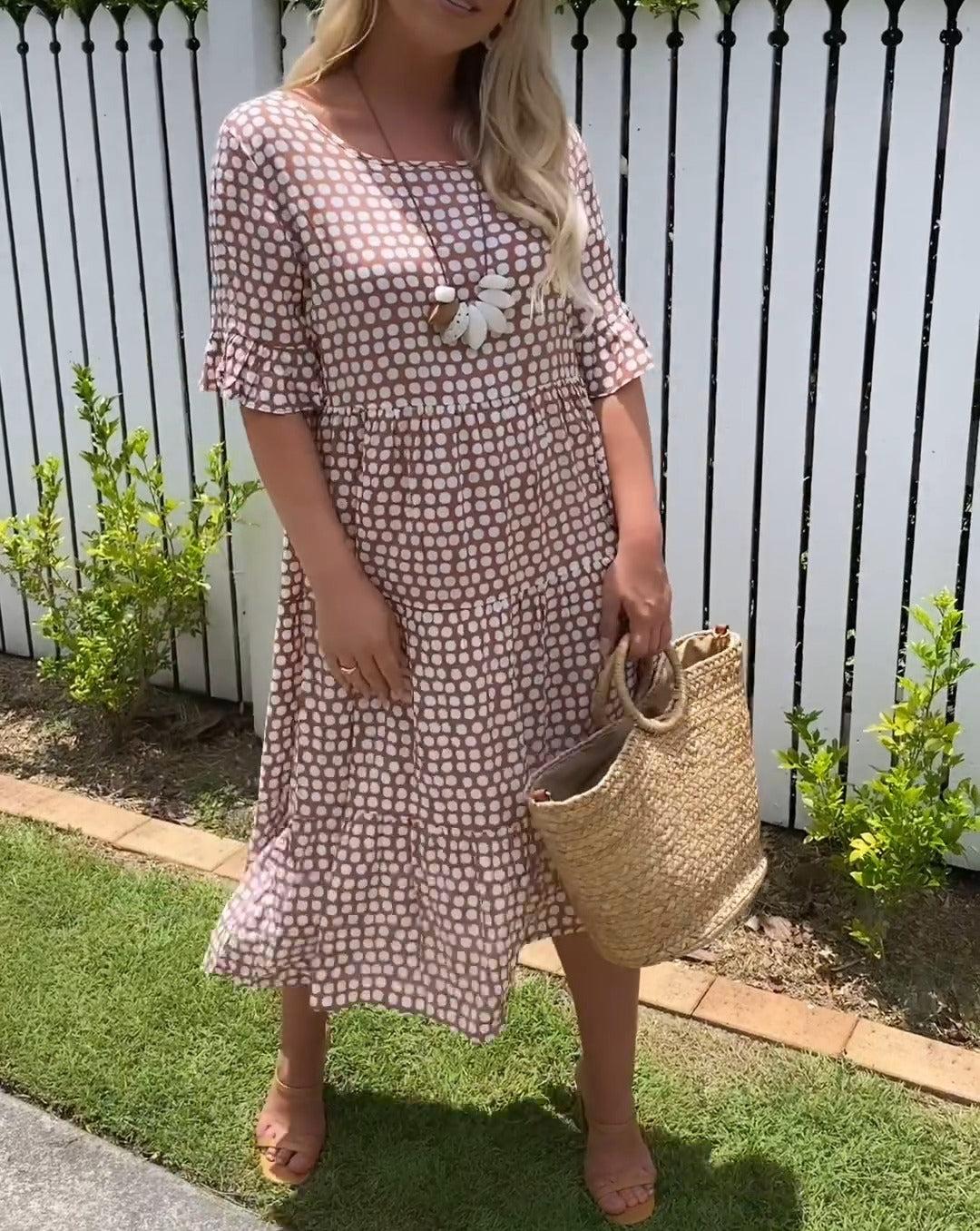 Brown dot-print summer dress with flower applique, short sleeves, tiered hem