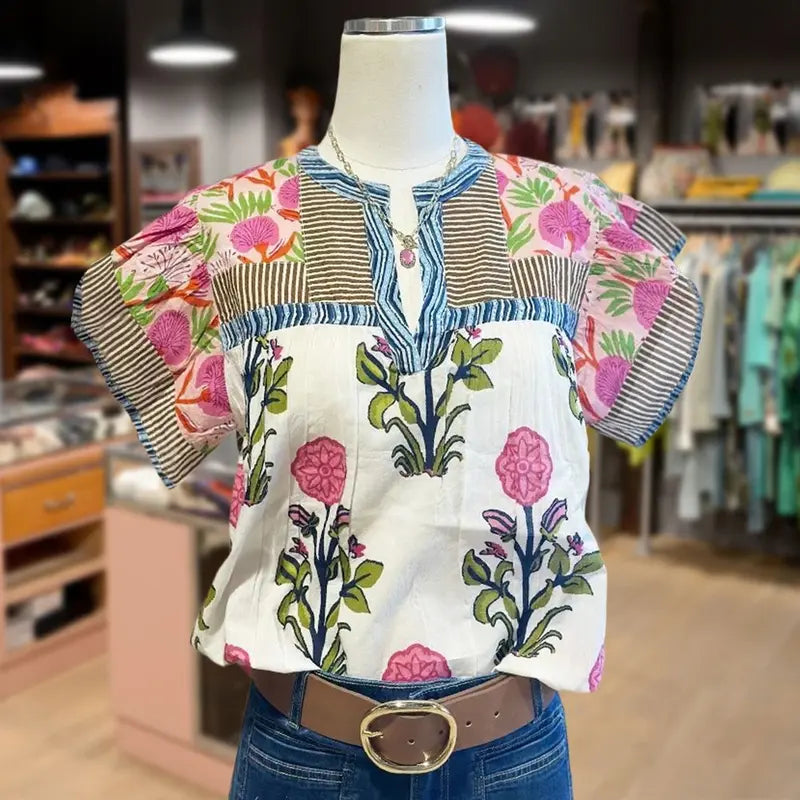 Women’s vintage floral top with striped yoke, button placket, and mixed floral sleeves