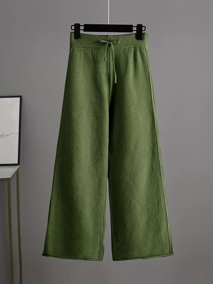 Olive green wide-leg knit trousers with drawstring waistband