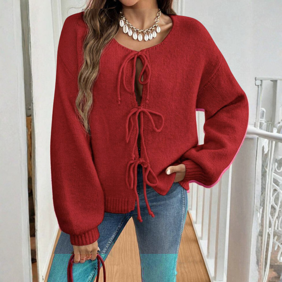 Red tie-front cardigan with round neck and drawstring lacing, long sleeves