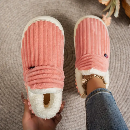 Pink comfort slippers with ribbed fabric and white fuzzy lining, moc-toe style