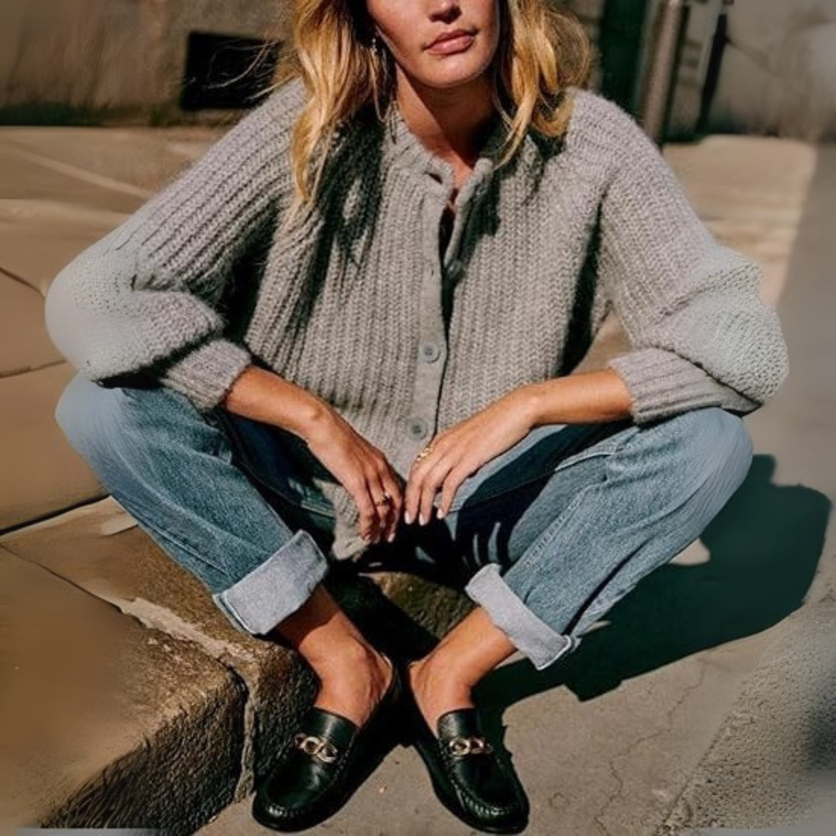 Light gray button-front round-neck long-sleeve knit cardigan with ribbed texture