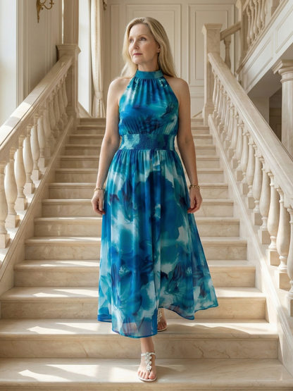 Gathered halter midi dress in blue abstract print with smocked waist and halter neckline