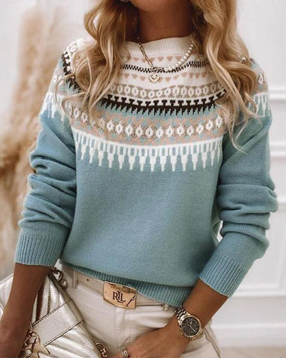 Teal Fair Isle knit sweater with patterned yoke and bands across the chest