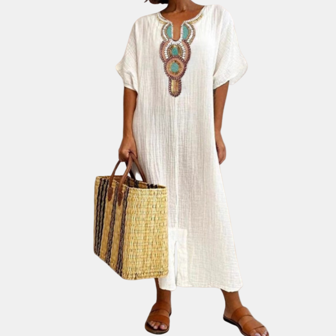 Embroidered white maxi dress with keyhole neckline and short sleeves, loose fit