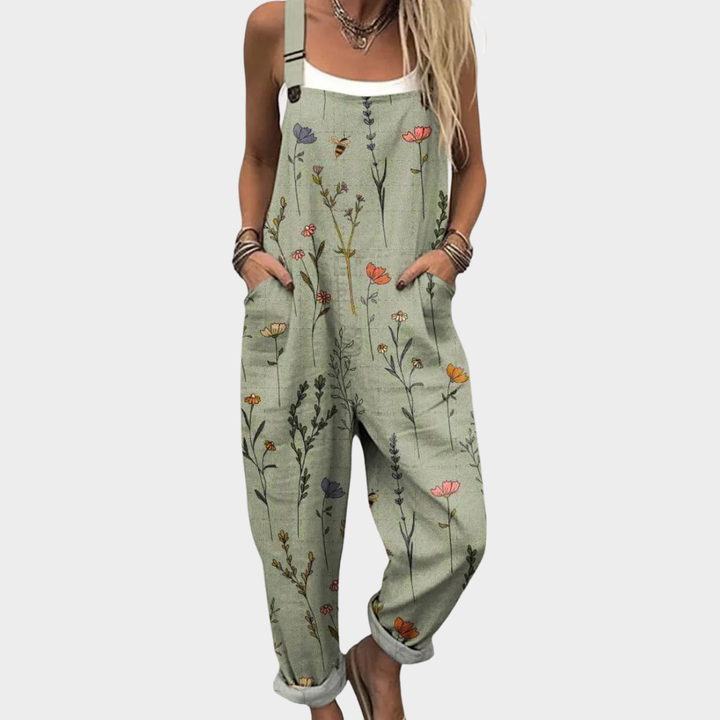 Women's light green floral printed overalls with wide straps and front pockets