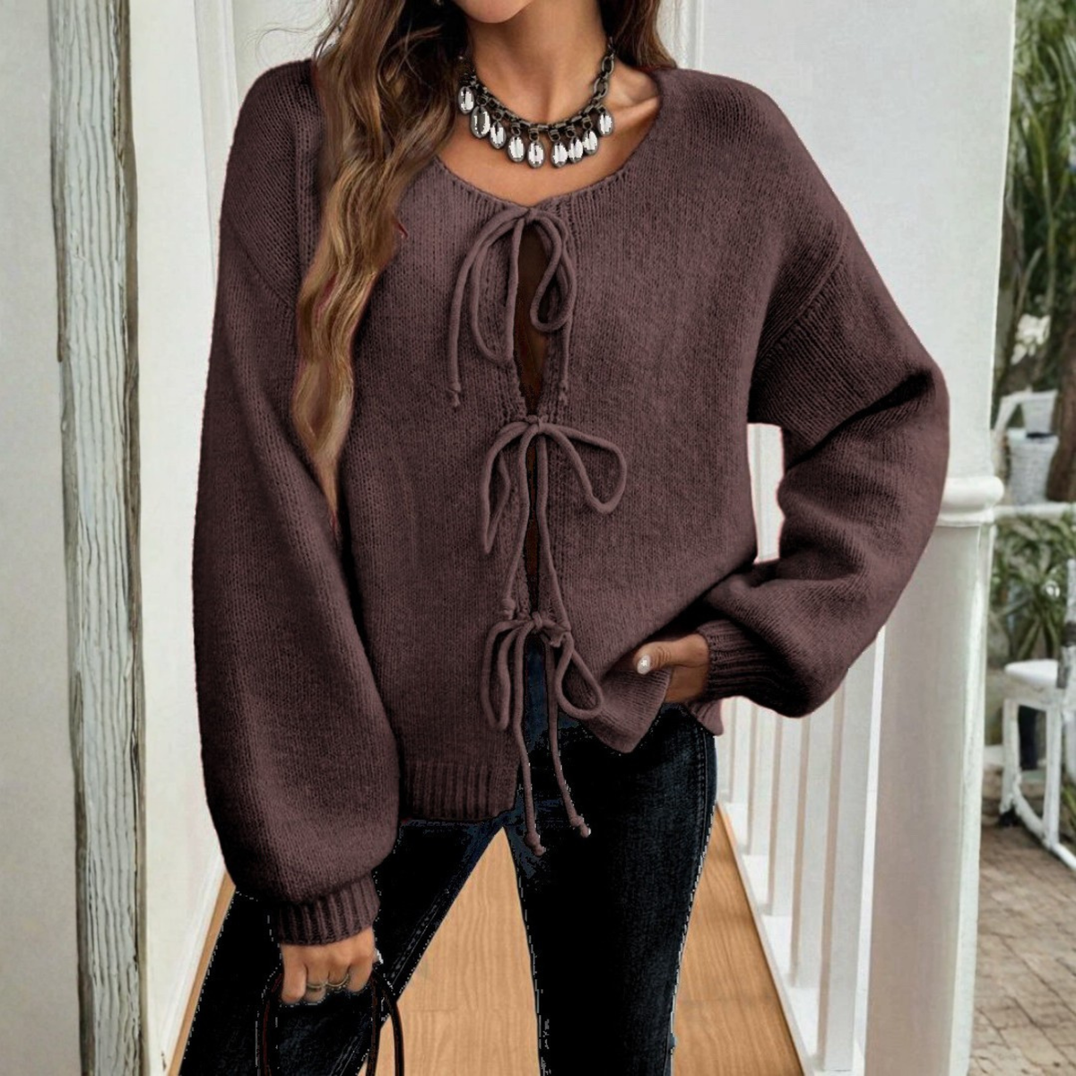 Brown tie-front knit cardigan with long sleeves, round neck, lace-up bow ties