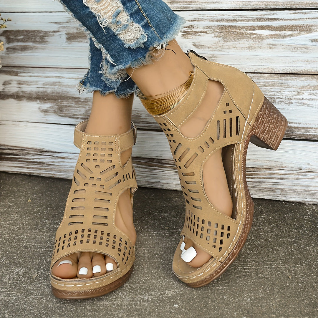 Light brown ergonomic sandals with peep toe, ankle buckle, and perforated panels