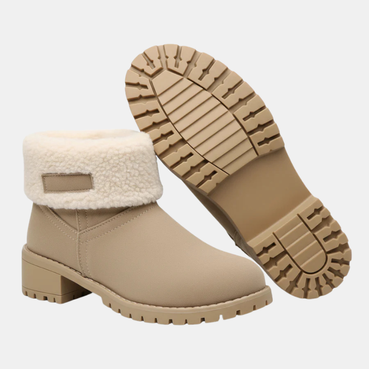 Women’s beige ankle boots with sherpa cuff and textured tread sole with block heel