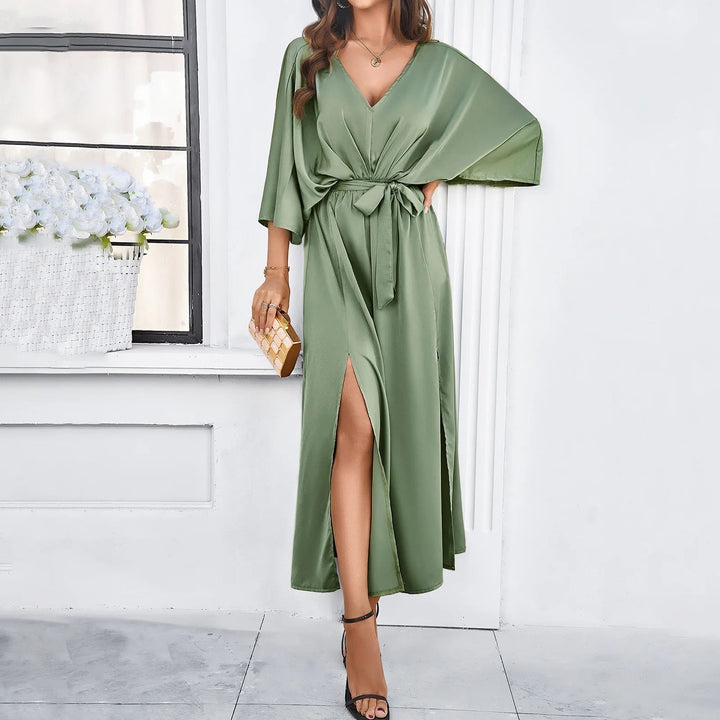 Green elegant maxi dress with V-neck, tied waist, loose sleeves and front slit