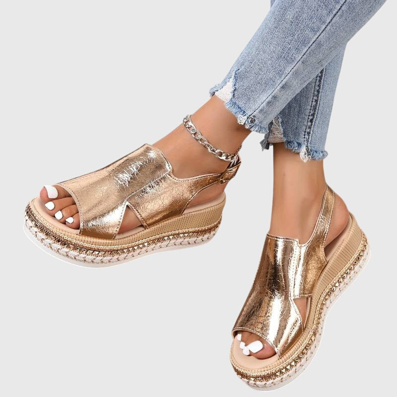 Gold metallic orthopedic sandals with open toe strap and platform espadrille sole