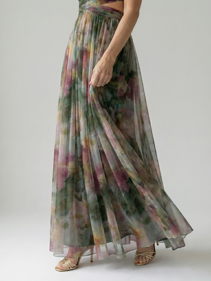 Maxi wrap dress skirt side view, sleeveless V-neck twist-front, multicolor green-pink print