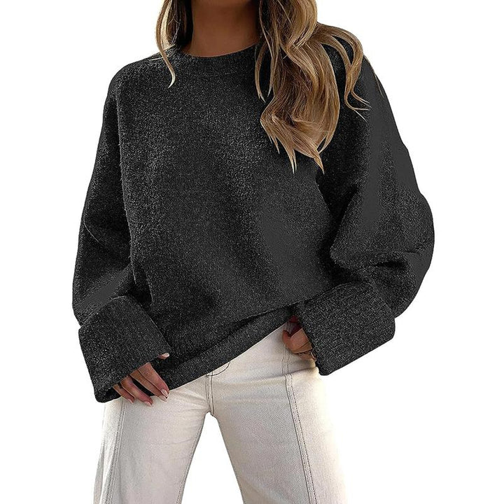 Black crewneck long-sleeve pullover sweater with ribbed cuffs and hem