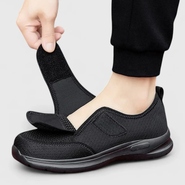 Black orthopedic Velcro slip-on shoes with open hook-and-loop strap