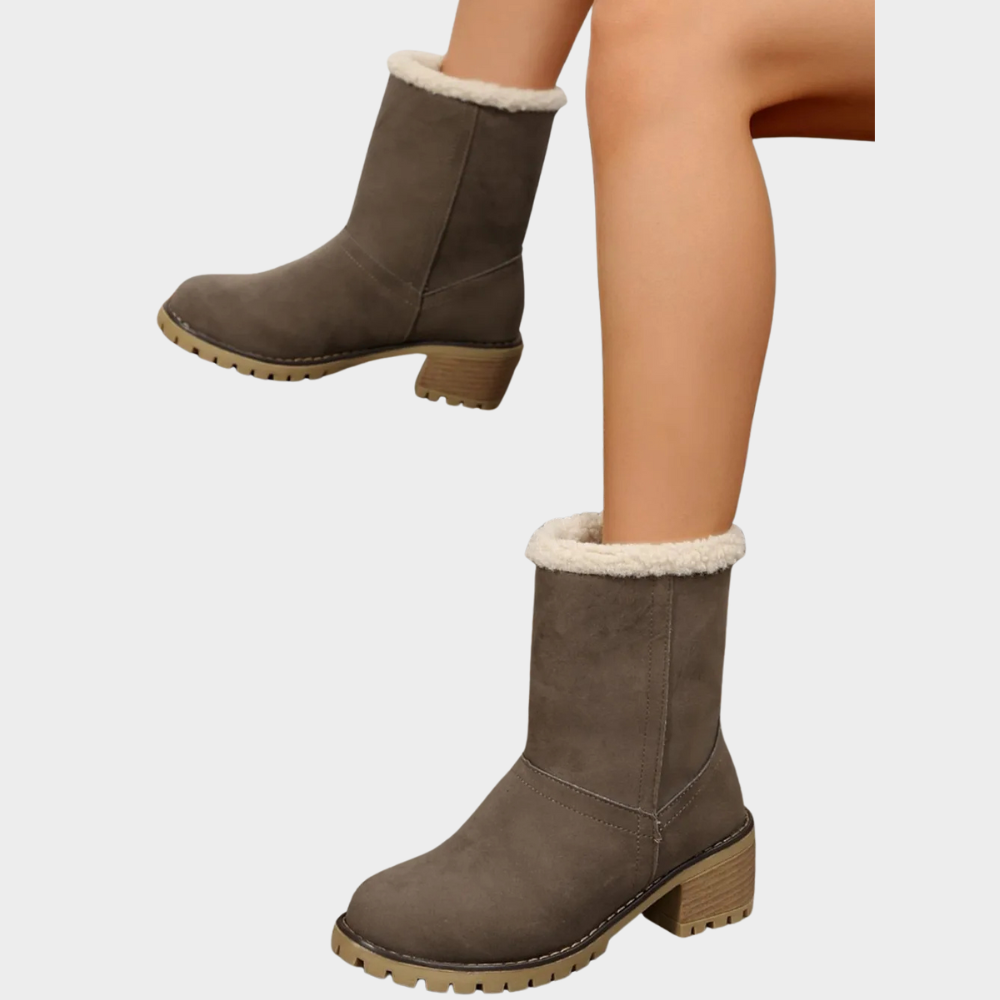 Taupe suede mid-heel winter boots, side view with white sherpa cuff and tread sole