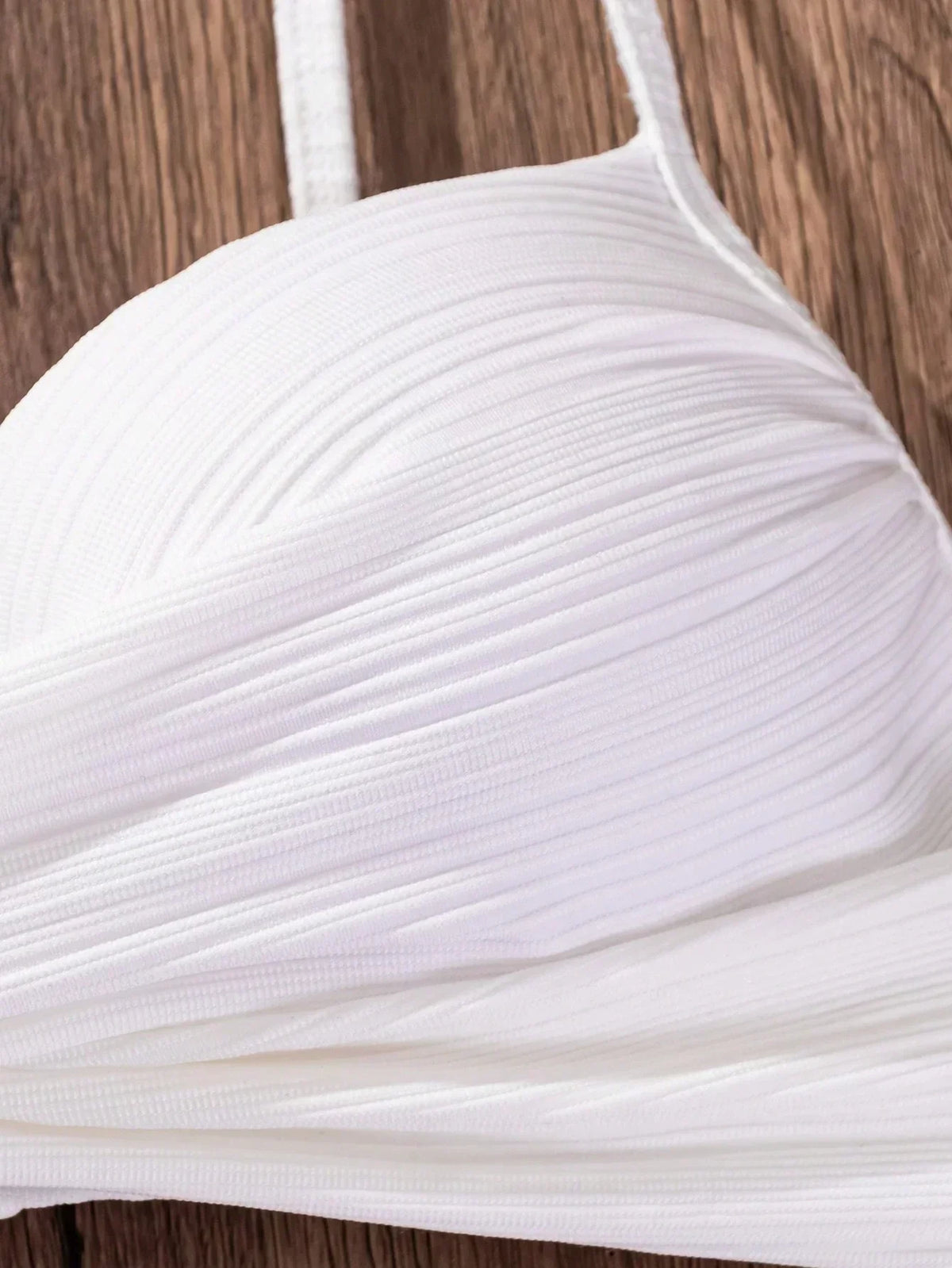 White textured bikini top with ruched cups and thin shoulder straps