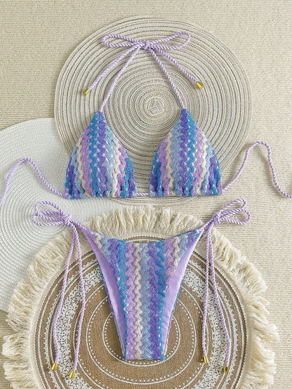 Purple crochet-look triangle bikini with zigzag knit pattern and tie sides