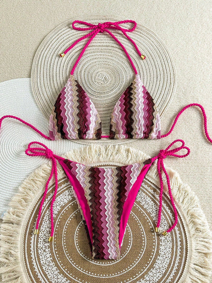 Pink crochet-look triangle bikini with zigzag knit pattern and tie sides