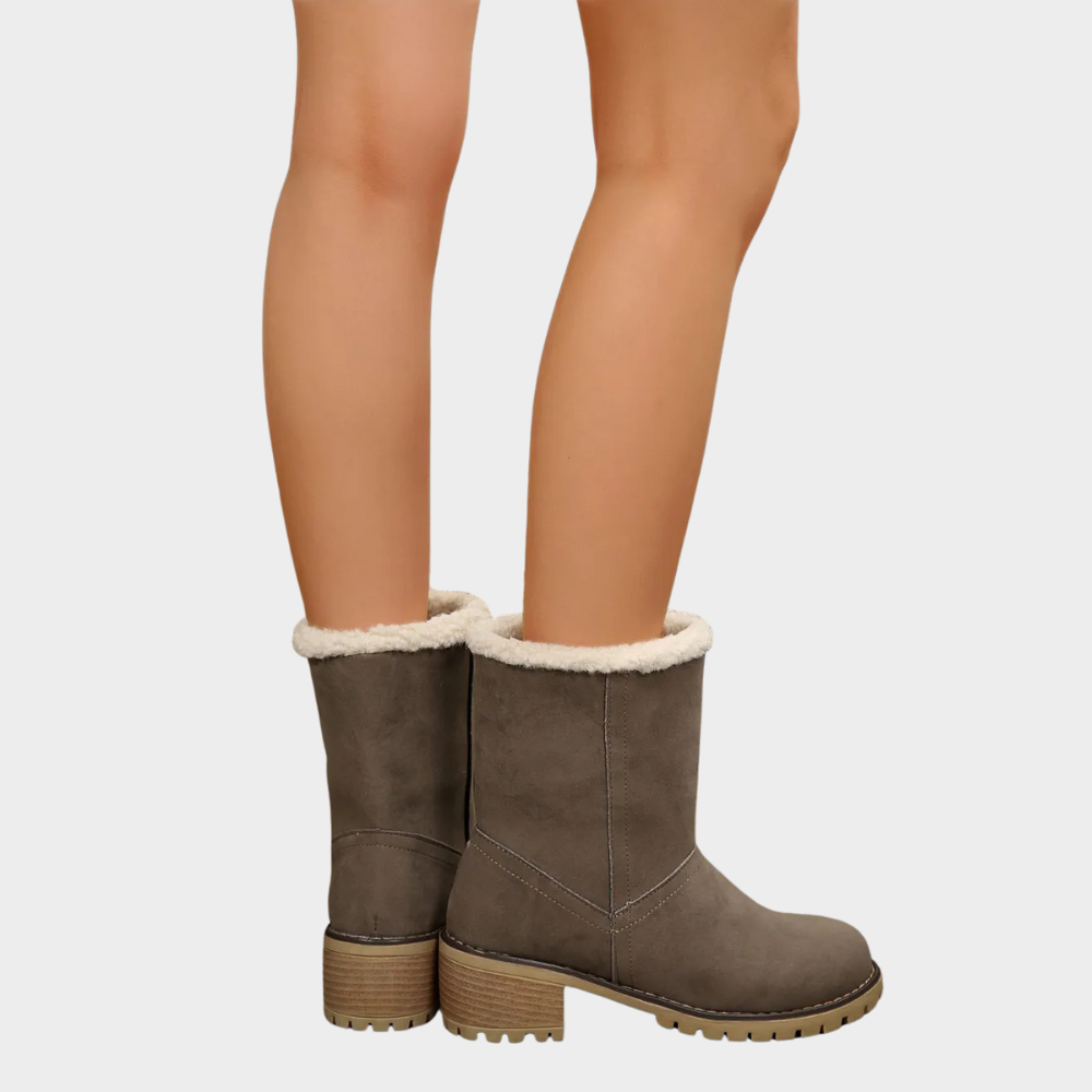 Taupe suede mid-heel winter boots with white sherpa lining at the ankle opening