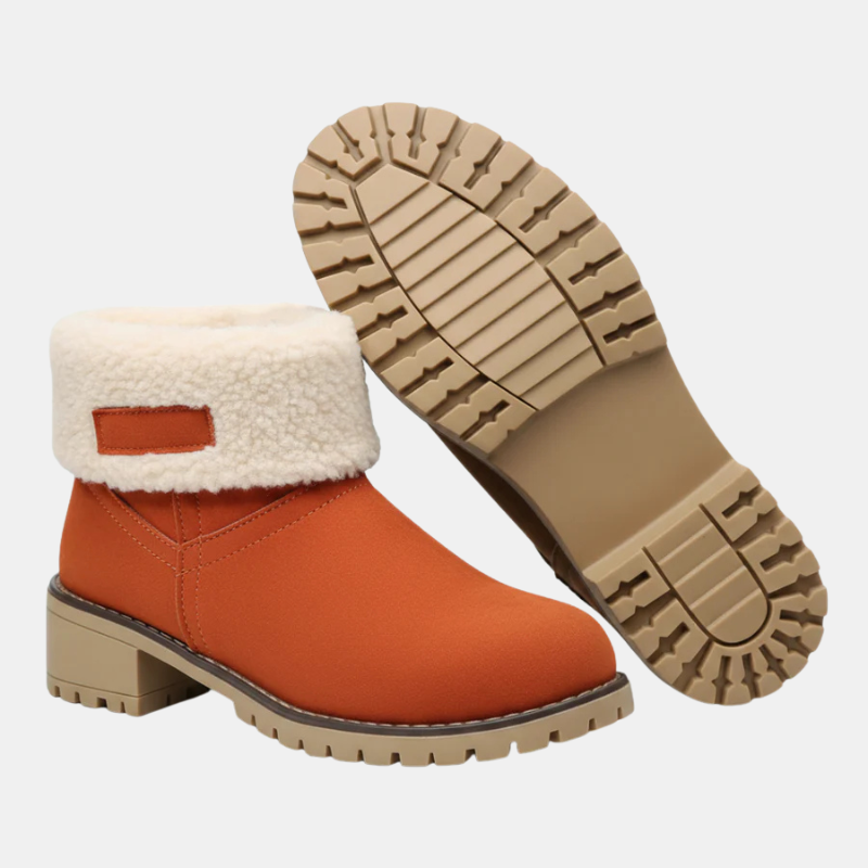 Women’s orange ankle boots with sherpa cuff and textured tread sole with block heel