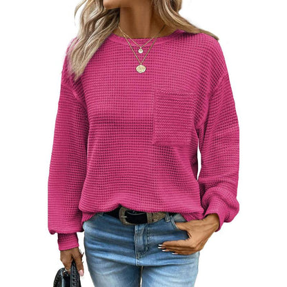 Rose red oversized long-sleeve crewneck blouse with waffle knit texture and chest pocket