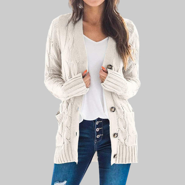 Light beige long-sleeve button cardigan with textured knit and ribbed cuffs, open front